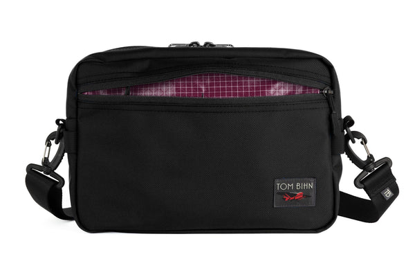 The Side Hustle in Black Ballistic with Acai (purple) 200 Halcyon interior.